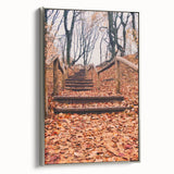 Framed canvas depicting a vintage-style landscape painting with colorful autumn trees and a black background.