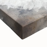 Close-up view of a vibrant stretched canvas artwork featuring abstract figurative designs in bold colors. The textured surface adds depth, perfect for modern decor.