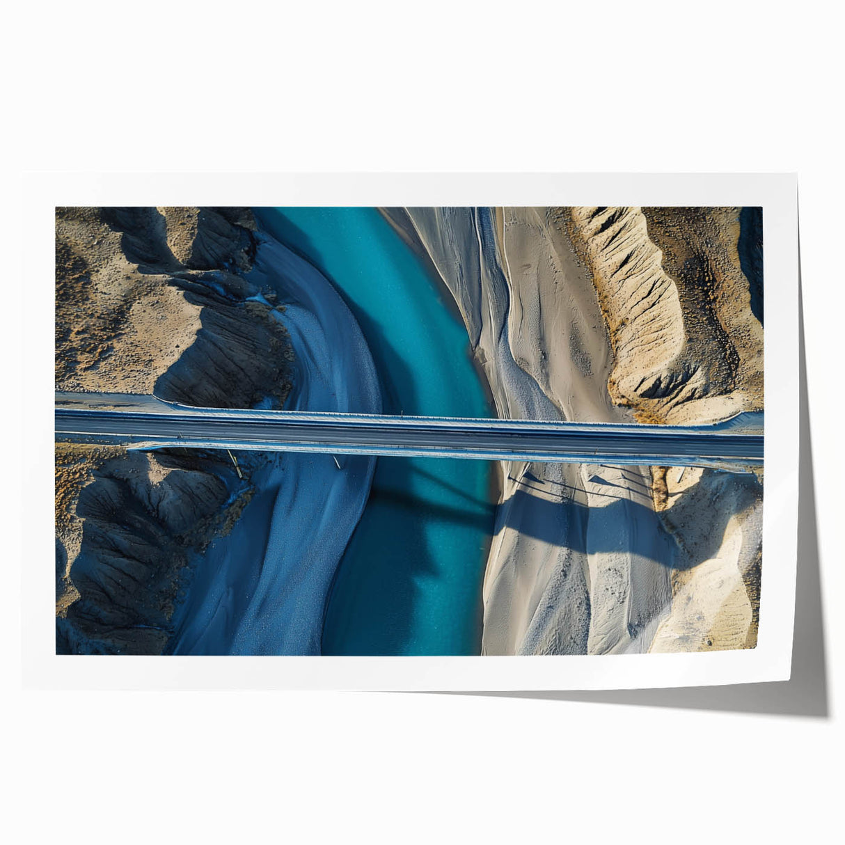 Landscape bridge rolled print showcasing a serene river scene with vibrant greenery and a clear blue sky, elegantly packaged in a protective cardboard tube. This high-quality art piece enhances home decor with its tranquil nature theme.