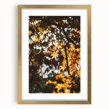 Extra large abstract art print featuring textured autumn hues in a gold frame, ideal for living room decor.