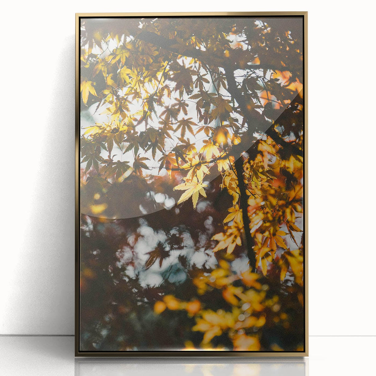 Mid-century modernist art of autumn trees in vibrant orange and gold tones, framed acrylic print.
