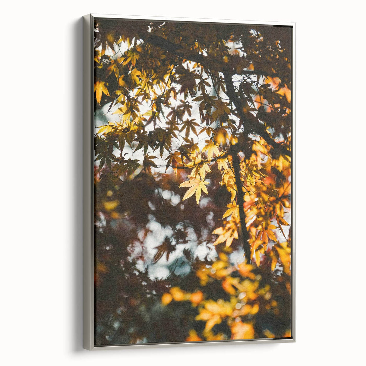Framed canvas of a fall landscape painting with muted earth tones, ideal for living room decor.
