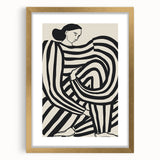 Abstract figurative artwork framed in elegant gold, showcasing intricate designs and textures, ideal for modern home decor, with a stylish mat enhancing its visual appeal.