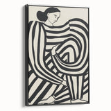 Abstract figurative artwork framed in black, showcasing a dynamic blend of colors and shapes, ideal for modern decor. Perfect for enhancing contemporary living spaces.