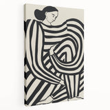 Abstract figurative stretched canvas artwork showcasing vibrant colors and dynamic shapes, displayed in a gallery setting, emphasizing modern artistic expression.