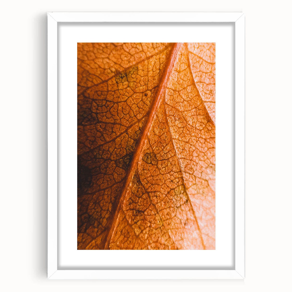 Abstract art print featuring swirling orange and yellow hues on a white framed canvas, suitable for dining room decor.