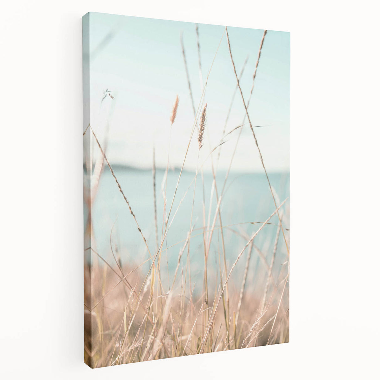 Abstract depiction of summer season in vibrant orange and yellow tones on a large stretched canvas.