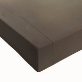 Close-up of abstract floral wall art on stretched canvas, featuring vibrant colors like pink, yellow, and green, perfect for modern home decor.