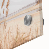 Large abstract wall art in warm orange and yellow tones on acrylic glass, suited for dining room ambiance.