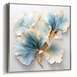 Framed canvas wall art showcasing an abstract floral design in vibrant colors, set against a silver frame, adding elegance to modern decor.