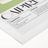 Art deco poster featuring a stylized cocktail glass, in vibrant orange and blue, on rolled canvas.