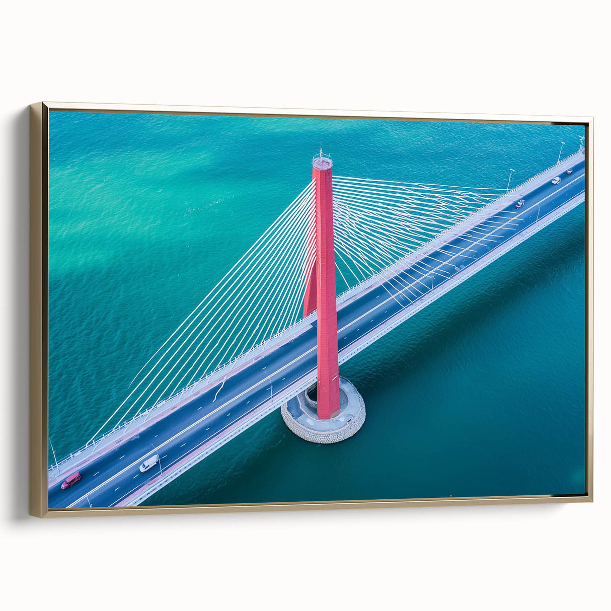 Framed canvas showcasing a lush landscape of a bridge surrounded by vibrant greenery and a golden hue, offering a serene, picturesque view perfect for home decor.