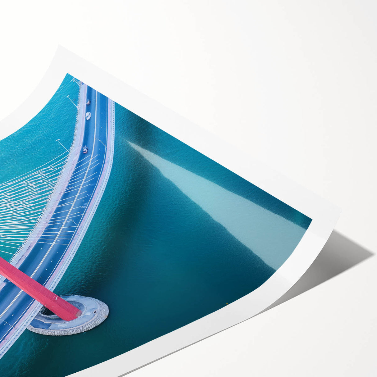 Rolled print of a serene landscape bridge design showcasing vibrant colors and intricate details, packaged securely in a protective cardboard tube for safe delivery.