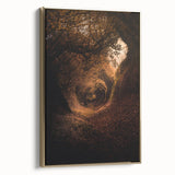 Framed canvas featuring a vintage poster art style landscape with autumnal trees and muted gold tones.