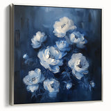 Framed canvas wall art showcasing abstract florals in vibrant colors, elegantly displayed with a silver frame, adding a modern touch to home decor.