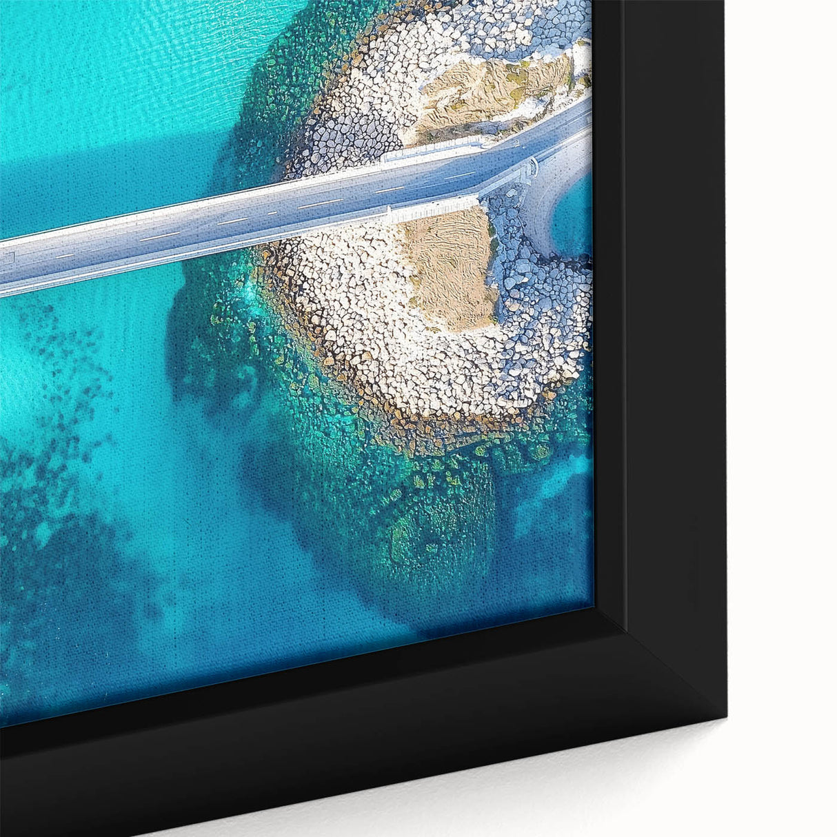 Close-up of a framed landscape canvas depicting a serene bridge scene over water, showcasing vibrant colors and intricate details, perfect for home decor.