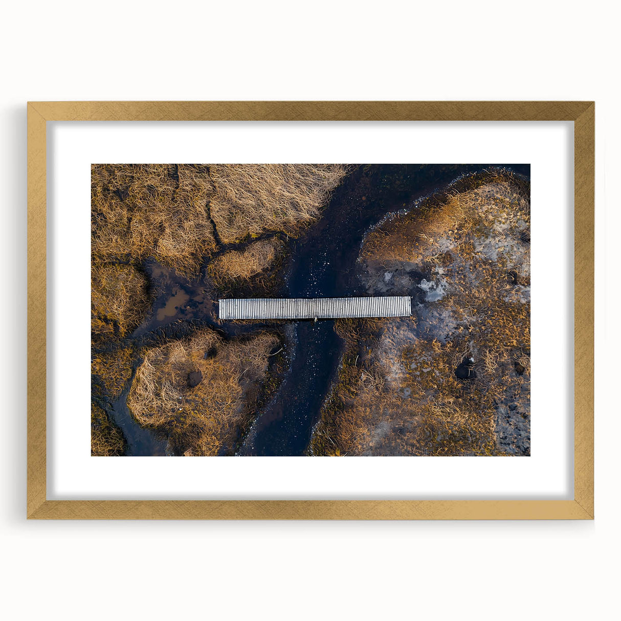 Gold-framed landscape bridge artwork with a mat, showcasing intricate details and vibrant colors, perfect for home decor or gallery display.