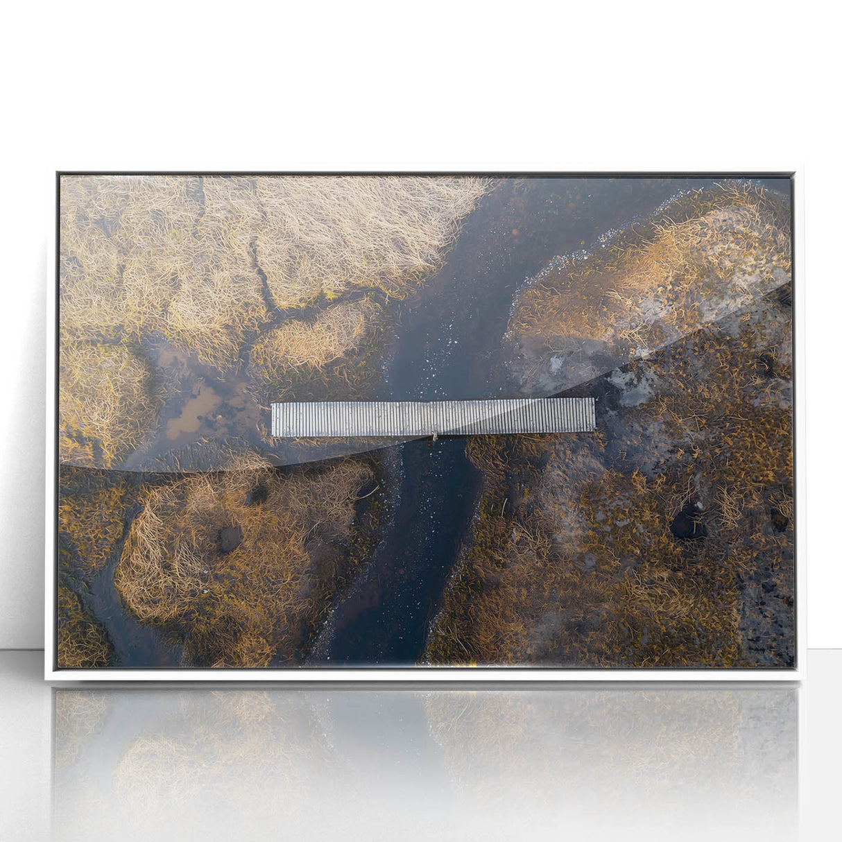 Framed acrylic artwork of a serene landscape bridge scene in white, showcasing vibrant colors and intricate details, perfect for home decor or office spaces.