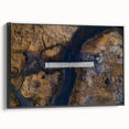 Landscape canvas artwork depicting a black-framed bridge in a serene natural setting, showcasing intricate details and vibrant colors, perfect for home decor.