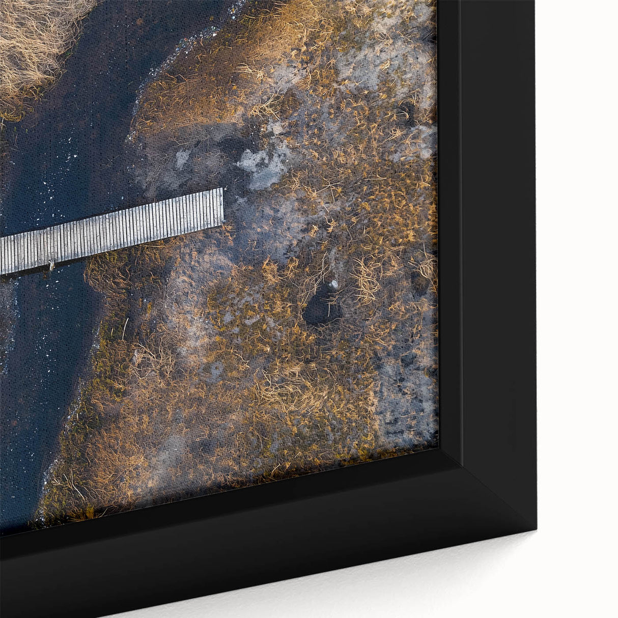 Close-up of a framed landscape canvas artwork depicting a serene bridge scene with vibrant colors, perfect for home or office decor, showcasing natural beauty and artistic detail.