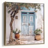 Framed canvas wall art featuring a vintage poster of a Greek architectural door in silver and gold tones.