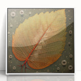 Framed wall art featuring a vibrant floral and botanical design with green leaves and colorful flowers, showcased in a sleek white frame, perfect for home decor.