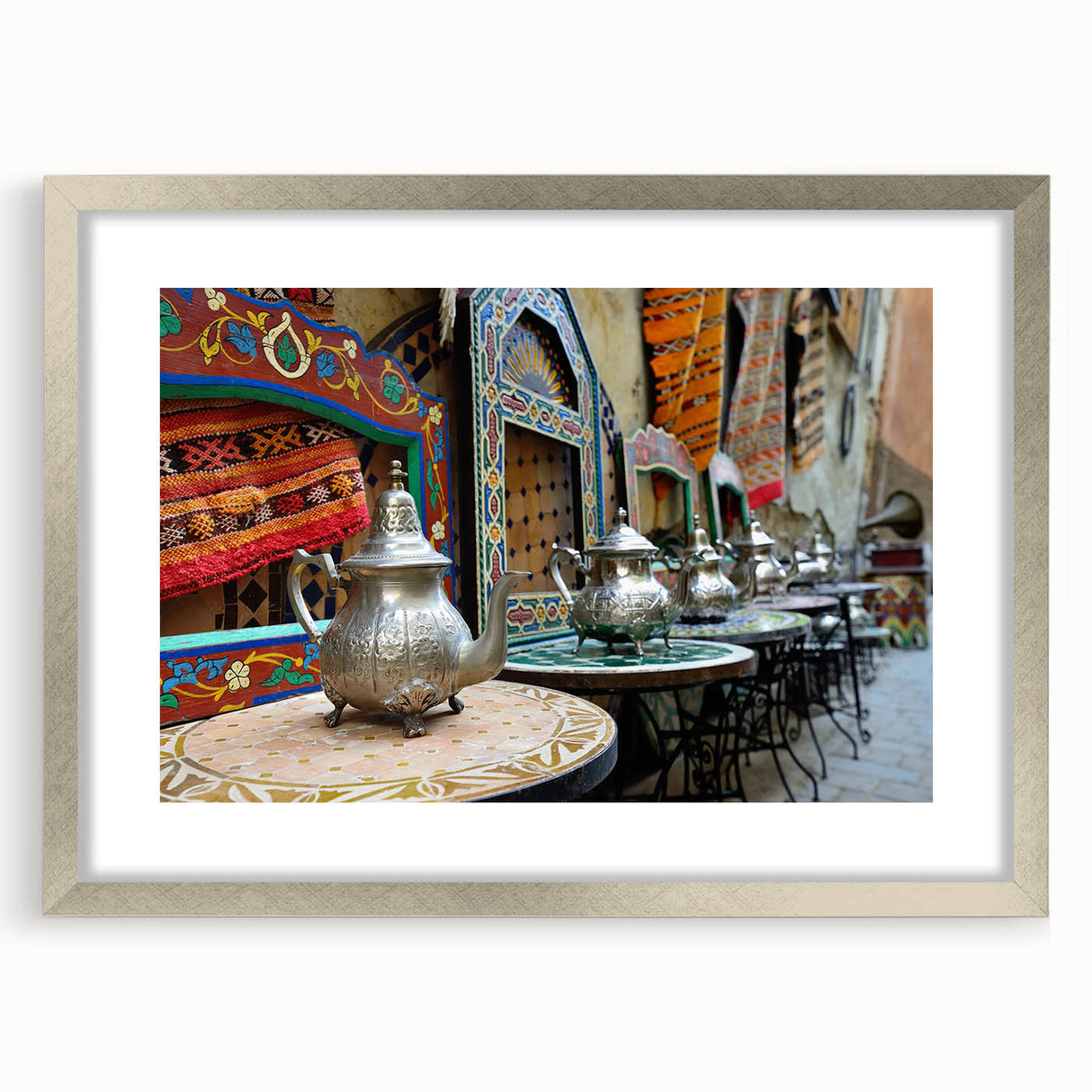Abstract art print of a Moroccan landscape in muted earth tones on a framed canvas, suitable for dining room decor.