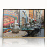 Mid-century modernist art depicting a Moroccan landscape in gold and earth tones on a framed acrylic print.