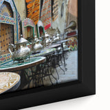 Extra large framed canvas featuring a textured Moroccan scenery in black with colorful art accents.