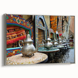 Vintage poster art of a Moroccan landscape in vibrant colors on a framed canvas, ideal for living room decor.