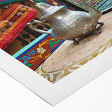 Art deco poster of a Moroccan landscape in earth tones on rolled canvas, suitable for dining room decor.