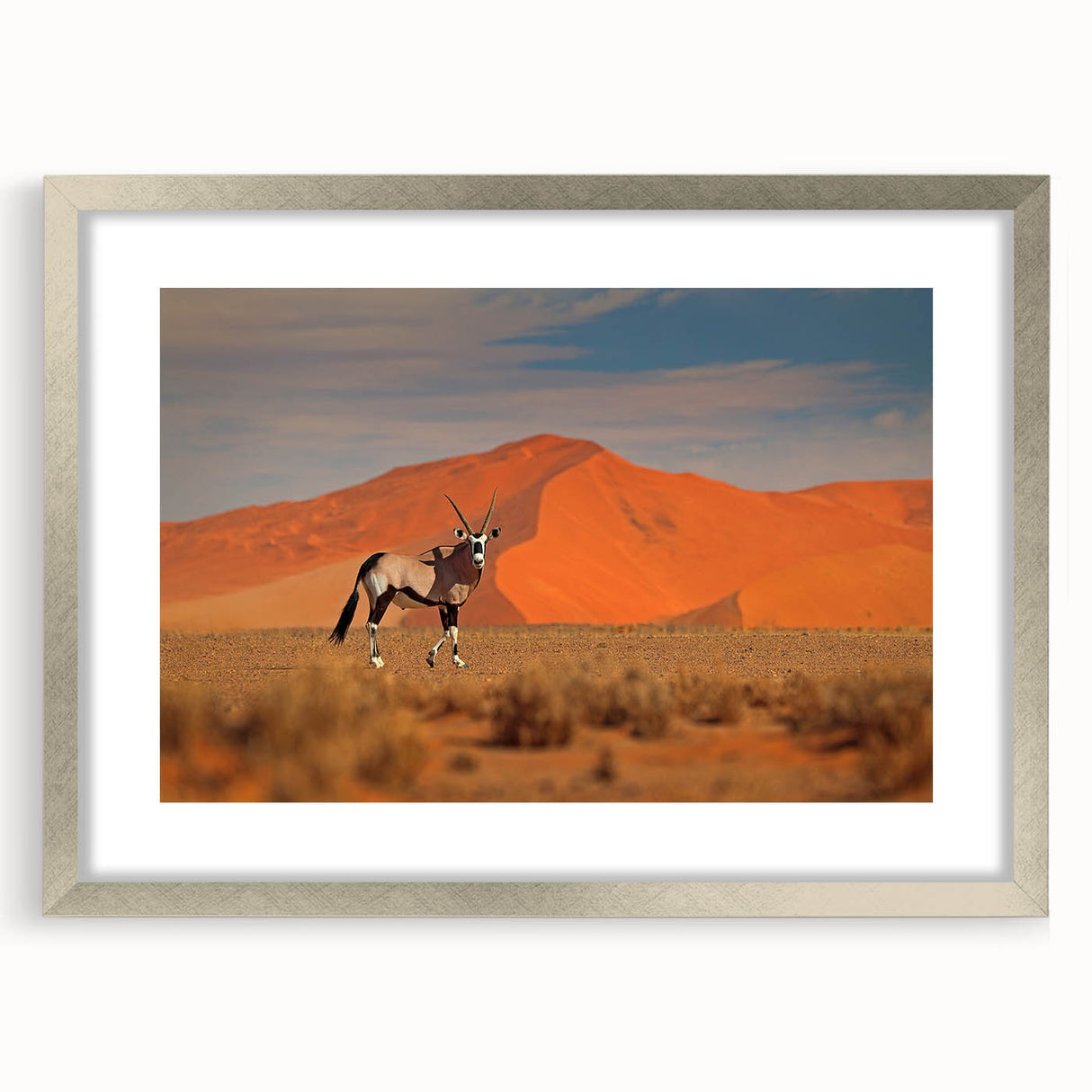 Abstract art print of a Namibian landscape in muted earth tones on a framed silver mat, ideal for dining room decor.