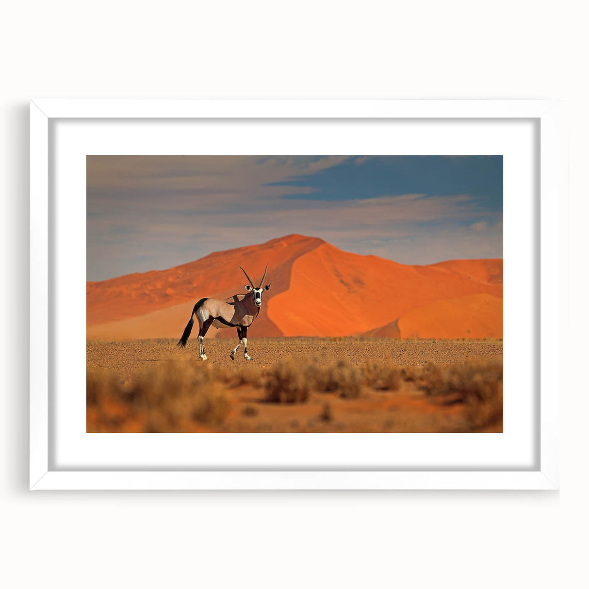 Extra large textured abstract art print depicting a Namibian landscape in earth tones, framed with a white mat.