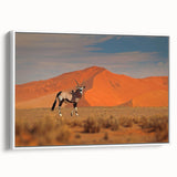 Vintage poster art of an African landscape in muted earth tones on a framed canvas, suitable for living room decor.