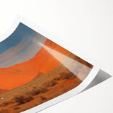 Extra large wall art featuring line art flowers in muted earth tones on a rolled canvas.