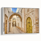 Vintage poster art of a Tunisian landscape on framed canvas, featuring vibrant colors, ideal for living room decor.