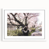 Abstract art print featuring a minimalist Japanese scenery in muted gray and blue tones on a framed white mat.