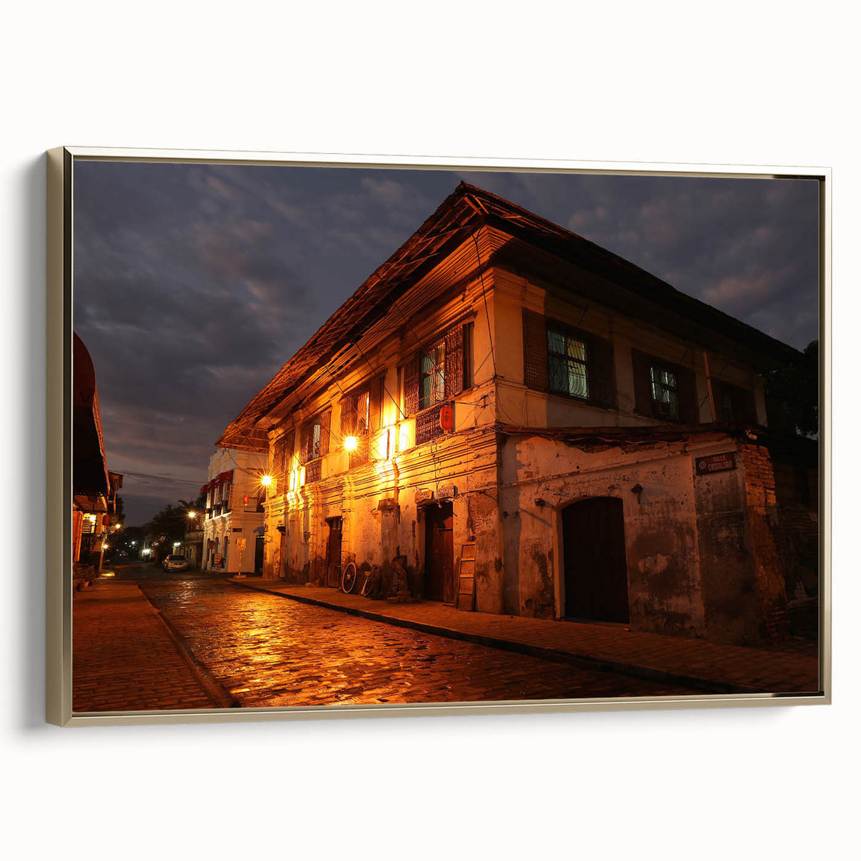 Framed canvas featuring a vintage-style landscape painting of the Philippine countryside in muted gold and black tones.