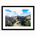 Extra large abstract art print of Yukon scenery in vibrant colors on a textured canvas, framed in black.