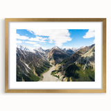 Extra large abstract art print of Yukon scenery in gold frame with mat, featuring textured brushstrokes in earth tones.