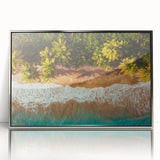 Large art print of a Caribbean scenery in Puerto Rico with vibrant blue and green hues, framed in silver acrylic.