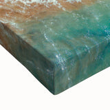 Large art featuring a black and white landscape painting of Caribbean scenery on stretched canvas.