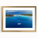 Extra large abstract art print featuring textured scenery of Central America, in gold frame, suited for living room decor.