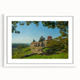 Abstract art print featuring a serene Albanian landscape in muted earth tones, framed in white, ideal for dining room decor.