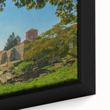 Extra large framed canvas featuring a textured depiction of an Albanian landscape in black with colorful accents.