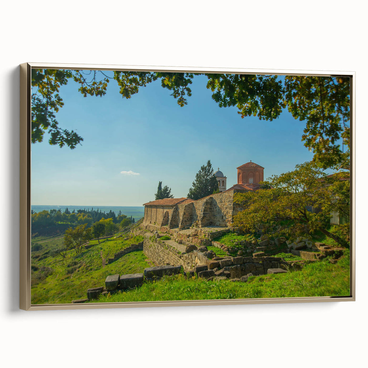 Framed canvas featuring a vintage-style landscape painting of an Albanian scenery, with muted earth tones.