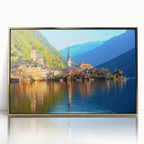 Art deco poster of a European Austrian landscape in muted gold and green tones, framed acrylic.