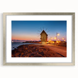 Textured abstract art print of a European scenery in muted earth tones on a silver-framed mat, suitable for bedroom decor.