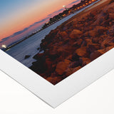 Art deco poster of a European scenery in muted earth tones on rolled canvas, suitable for dining room decor.