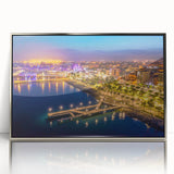 Large art print of a European Cyprus landscape in muted earth tones on a silver-framed acrylic.